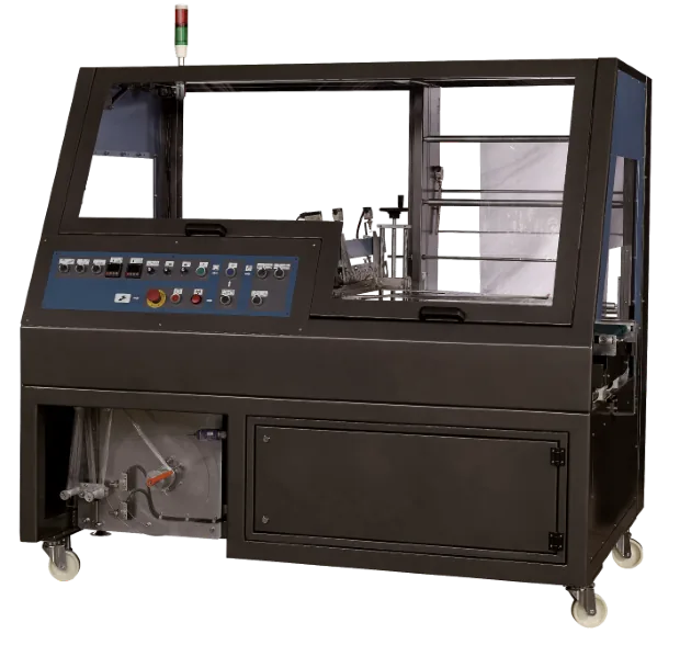 Extend packaging machine in a black cabinet with a glass window